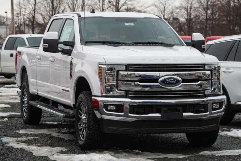 White Ford F-250 pickup truck at a dealership, How Much Does a Ford F150 Weigh?