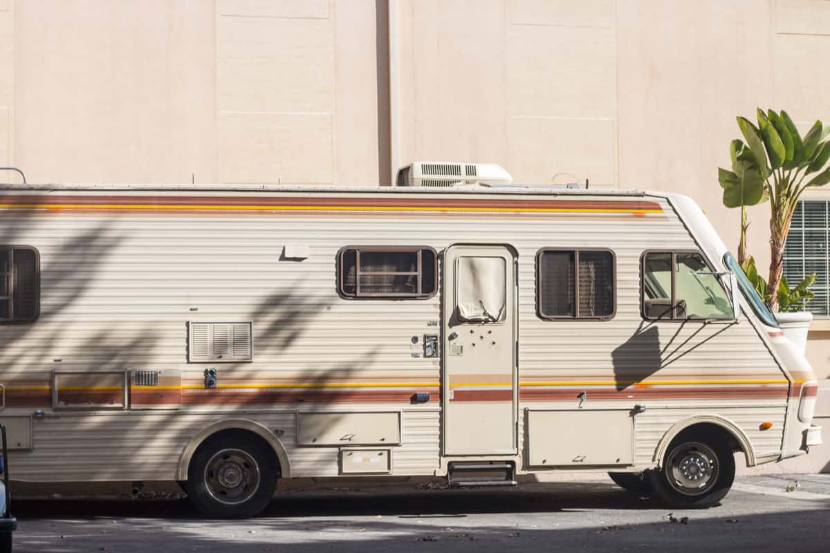 modern camper van parked on the sidewalk