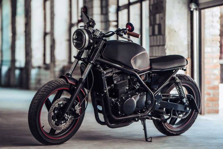 Modern black cruiser motorcycle in garage, Do Motorcycles Have Titles?