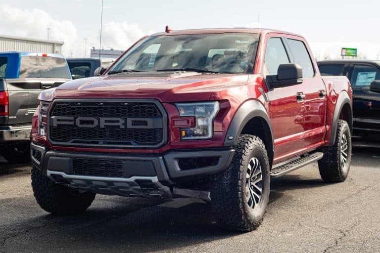 2020 Red Ford F-150 Raptor pickup truck at a Ford dealership, Ford Triton V-10 specs [And More Info]