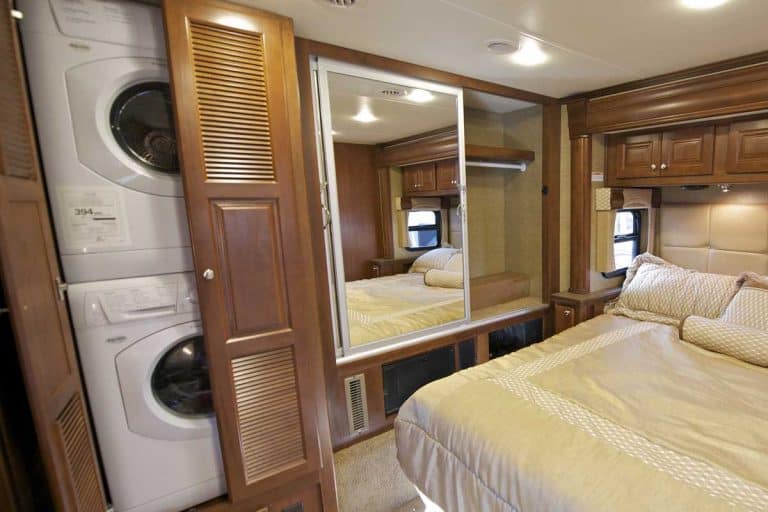RV bedroom with stackable RV washer, How Much Water Does an RV Washer Use?