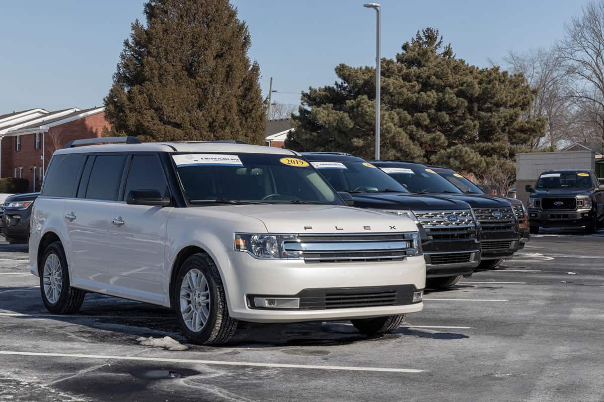 brand new ford flex cars parked on the outdoor parking lot