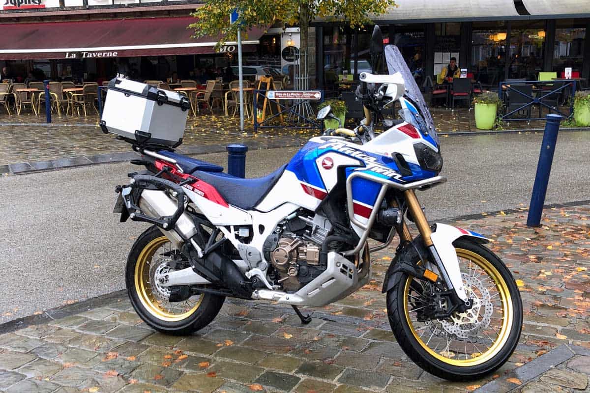 Honda Africa Twin motorcycle parked by the side, Can a Motorcycle be Automatic?