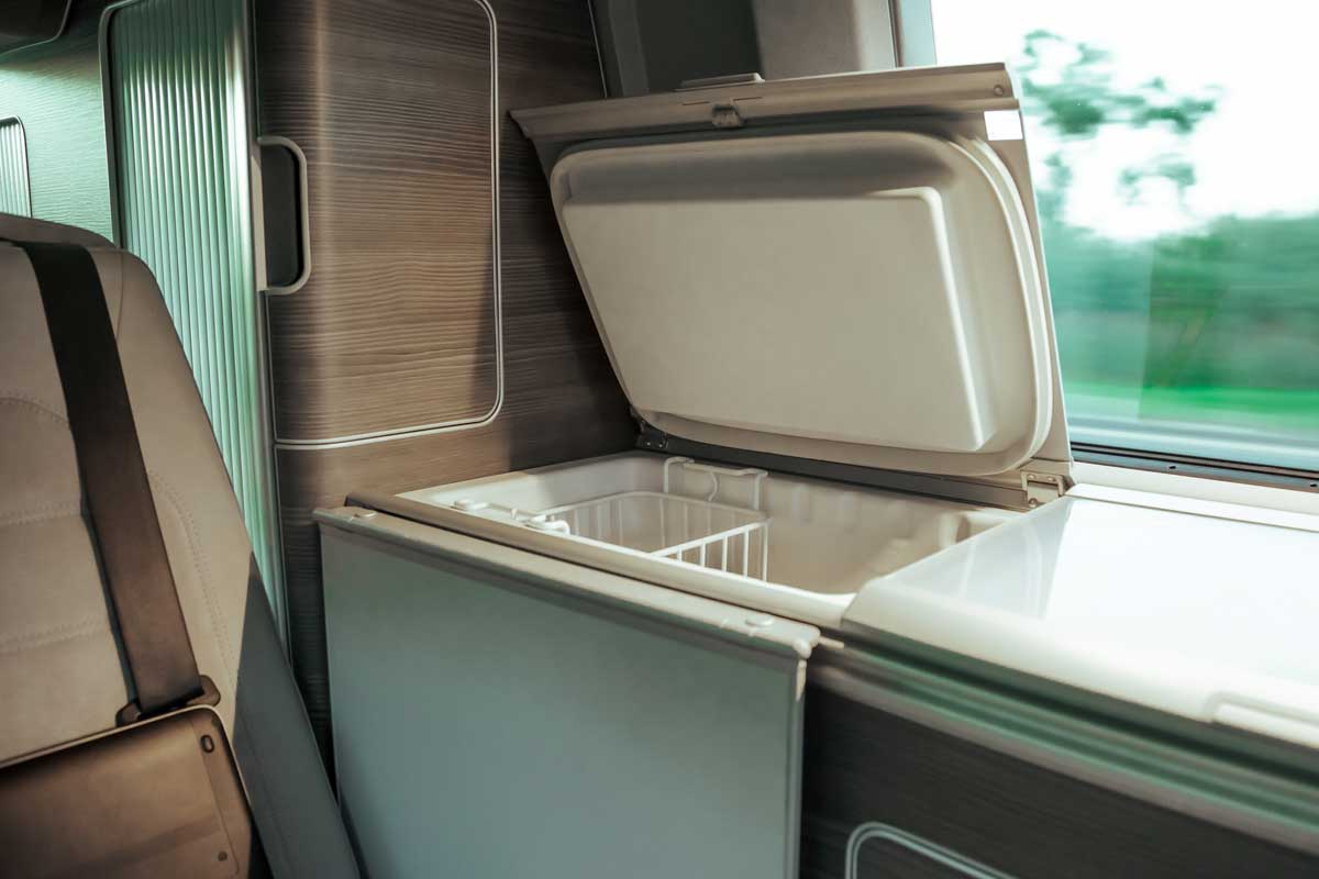 Interior of a modern RV with refrigerator, 9 Best RV Freezers [Inc. FAQs for choosing the best one for your needs]