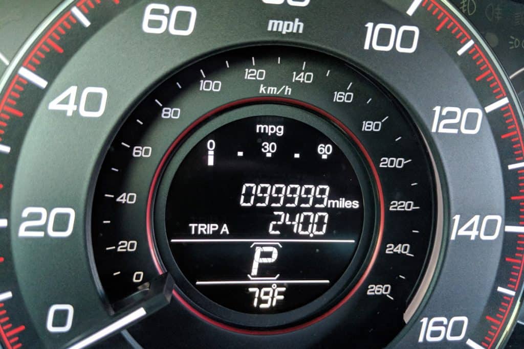 Odometer showing 99999 miles on its gauge