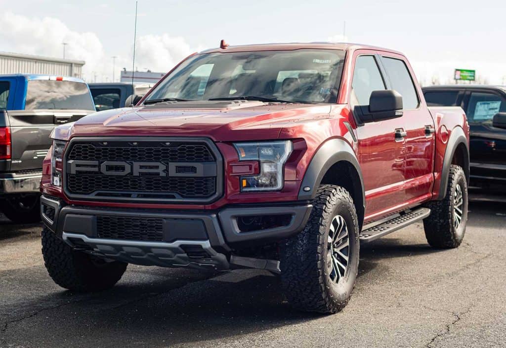 2020 Ford F-150 Raptor pickup truck at a Ford dealership