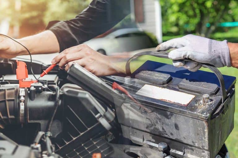 A collage of a man holding a car battery and a mechanic checking the car battery, How to Check Car Battery Life [3 Simple Ways]