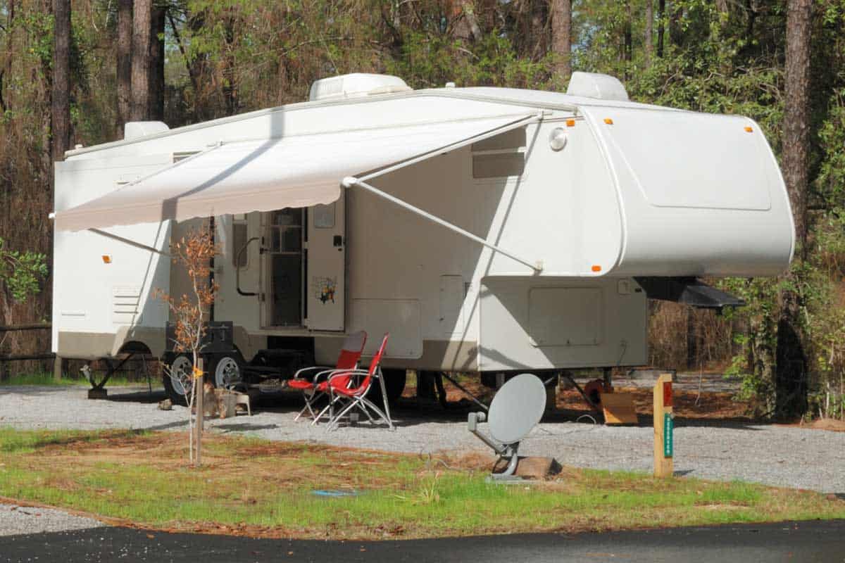 Fifth wheel camper at wet campsite, What's The Best RV To Live In Year Round?