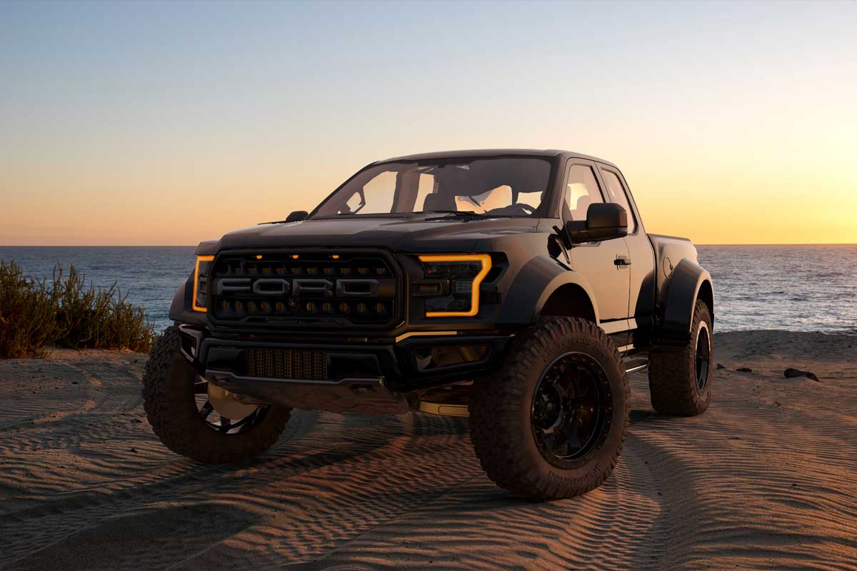 Ford F-150 Raptor - Most Extreme Production Truck On The Planet standing on a sand dune by the ocean, How Long is the Bed of a Ford F-150? [3 Types Discussed]