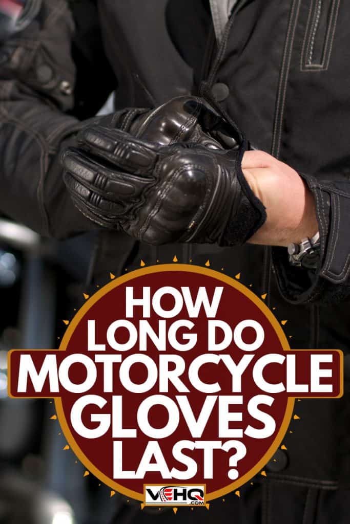 A motorcycle rider putting on his gloves before riding, How Long Do Motorcycle Gloves Last?