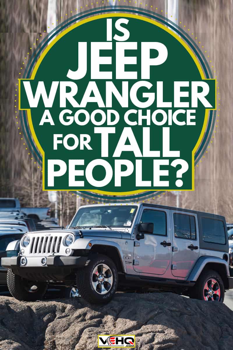 A Jeep Wrangler parked on top of a huge rock, Is Jeep Wrangler A Good Choice For Tall People?