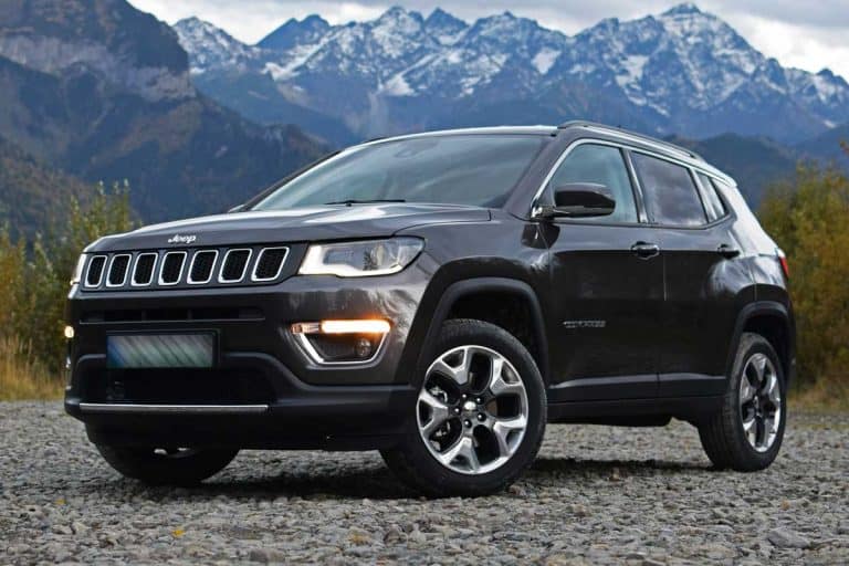 Jeep Compass parked on the mountain roads, Does Jeep Compass Come With Spare Tire?