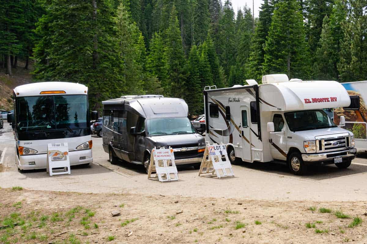 RV parking lot area with class a, b, and c motorhomes, What's the Difference Between Class A, B, and C Motorhomes?