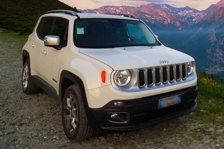 White Jeep Renegade parked on dirt road, Does Jeep Renegade Come With A Spare Tire?