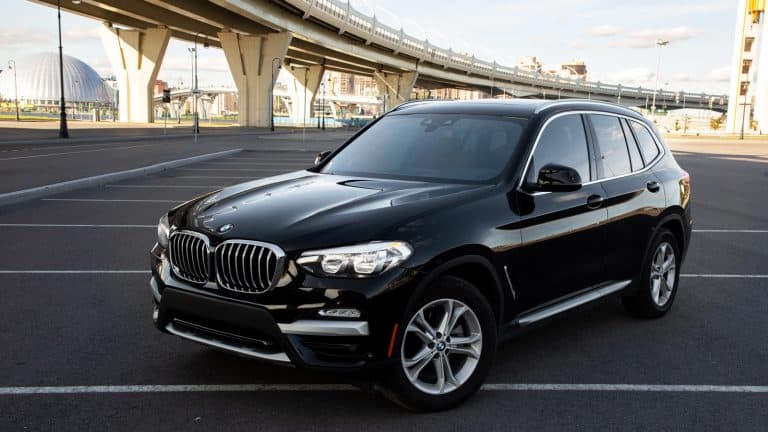 Front view of a black crossover BMW X31600x900