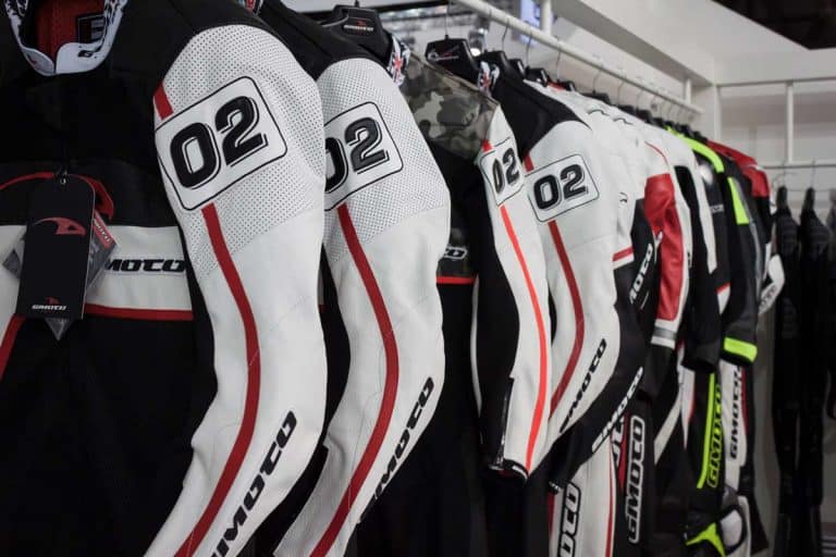 Motorcycle racing suits display, Why Do Motorcycle Suits Have A Hump?