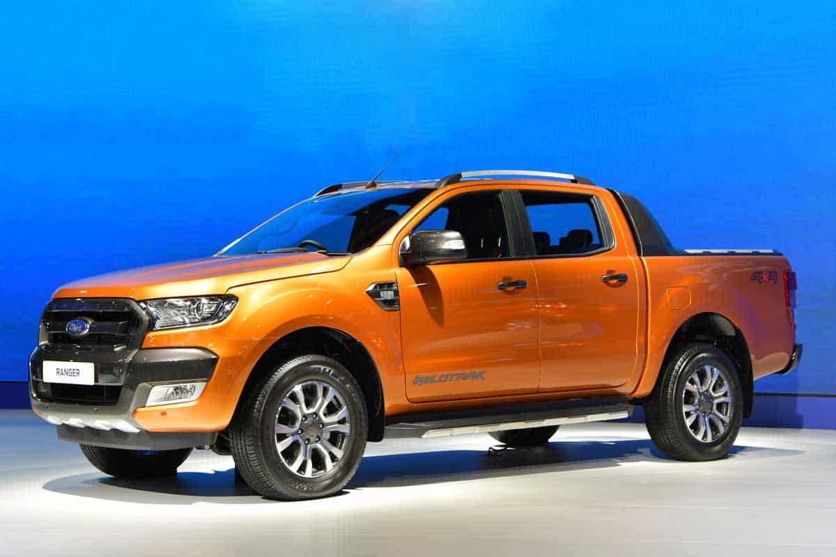 Orange Ford Ranger pickup truck on display at a motor show, Pickup Truck Door Won't Open? Here's What To Do