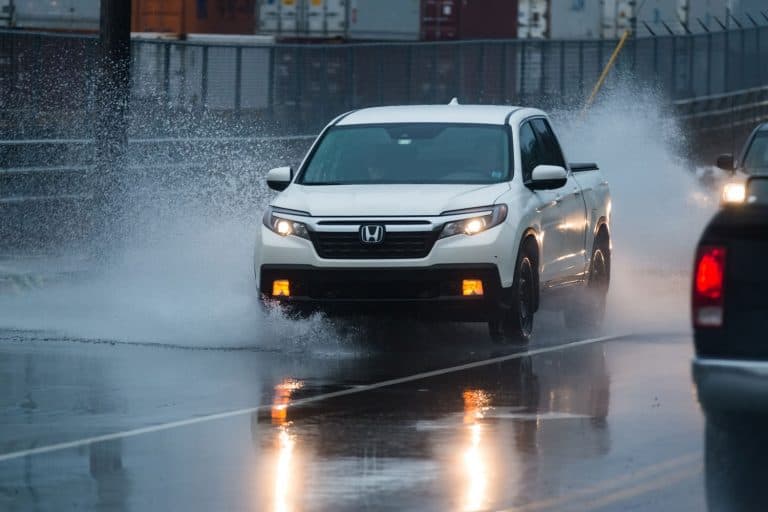 Honda Ridgeline moving on a wet and slippery stretch of highway, Can A Honda Ridgeline Be Flat Towed?