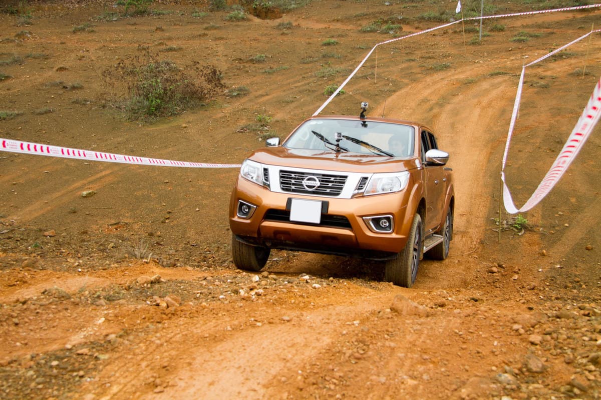 A Nissan Frontier doing a steep crossing test on a company owned test track