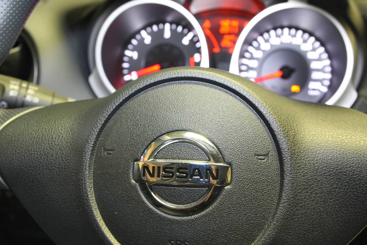 Nissan Titan steering wheel with the odometer and speedometer on the background, Nissan Titan Not Starting - What Could Be Wrong?