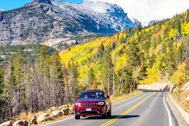 People drive in a Jeep Grand Cherokee in Rocky Mountain National Park Colorado USA on a sunny autumn day, Jeep Grand Cherokee Humming Noise When Accelerating - What Could Be Wrong?