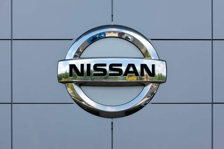 Nissan logo made from stainless steel, How Much Does a Nissan Titan Weigh?