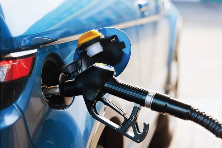Blue car getting fuel from a diesel pump, What Happens If You Put Diesel In Your Gasoline Car?