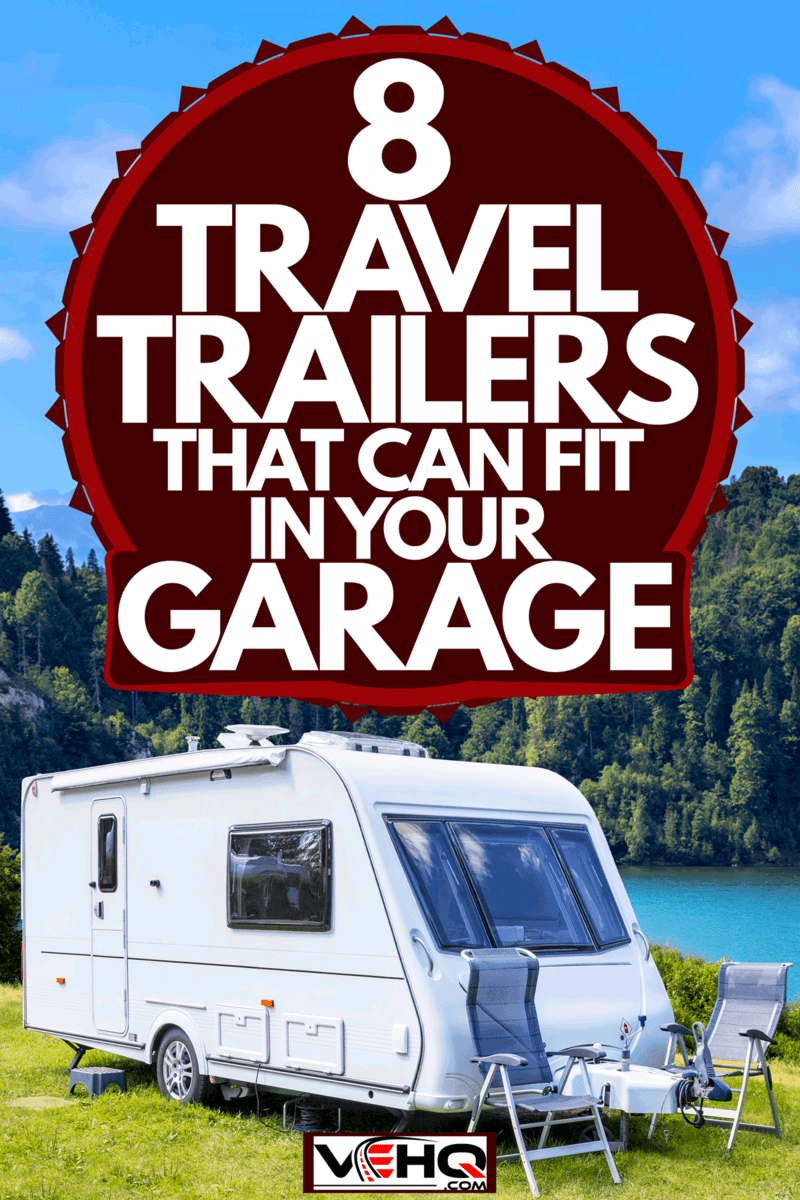 A camper van parked near a beautiful lake with a panoramic view of the mountains and vegetation, 8 Travel Trailers That Can Fit In Your Garage