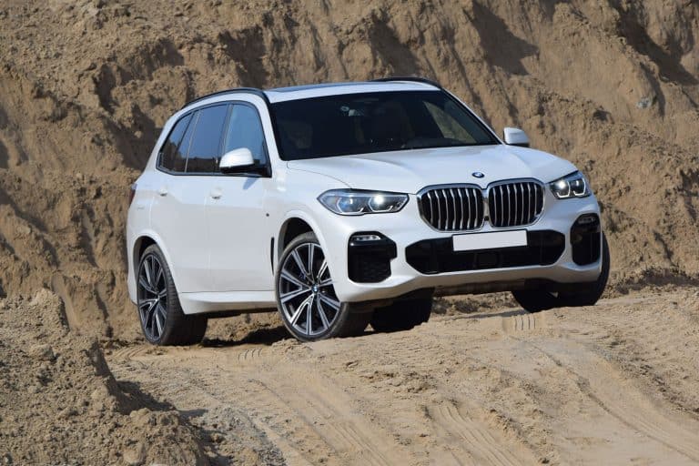 A BMW X5 trekking a dirt road, Is 2WD The Same As Front Wheel Drive (FWD)?