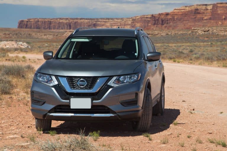 A Nissan Rogue trailing on the outback desert road of Arizona desert, What Cars Have Zero Gravity Seats?