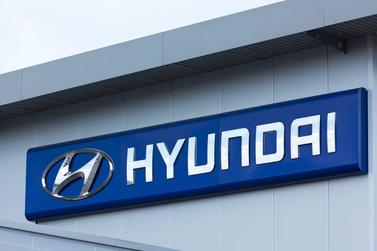 A huge Hyundai logo embedded on the front of the factory building, Does The Hyundai Palisade Come In Hybrid?