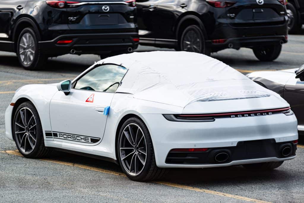 A new model Porsche 911 Cabriolet awaits transport from the Autoport, How Can I Find Out What Options My Car Was Ordered With?