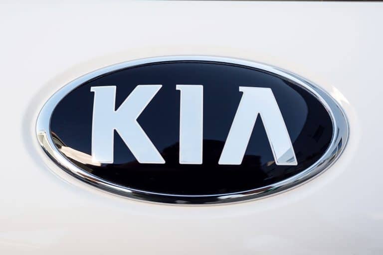An up close image of a Kia Logo on the back of an SUV, How Much Is A Fully Loaded Kia Telluride?