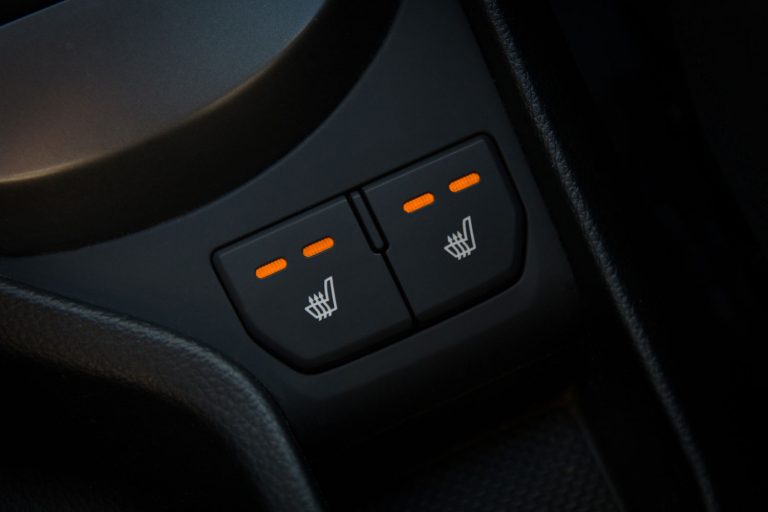 Seat heating buttons. Interior of car close up, Does The Hyundai Palisade Have Heated Seats And A Heated Steering Wheel?
