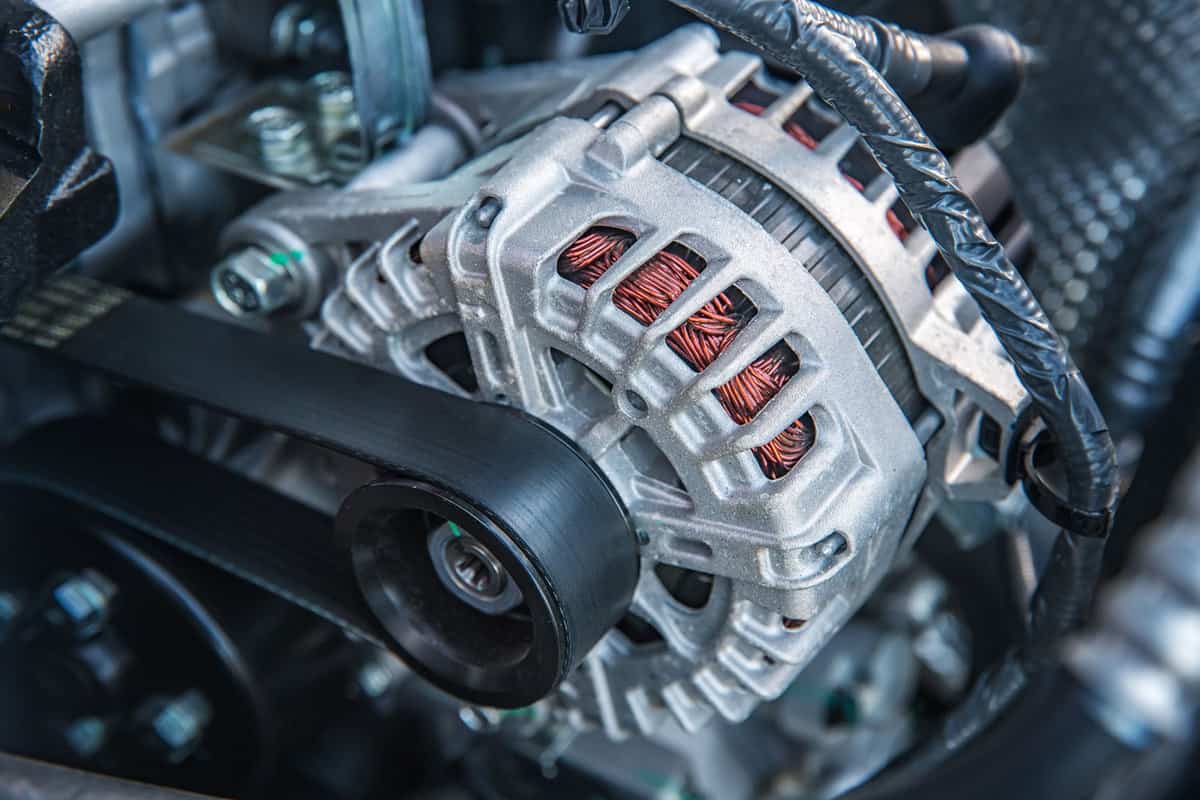 An up close photo of a car alternator, What Causes A Car To Lose All Electrical Power?