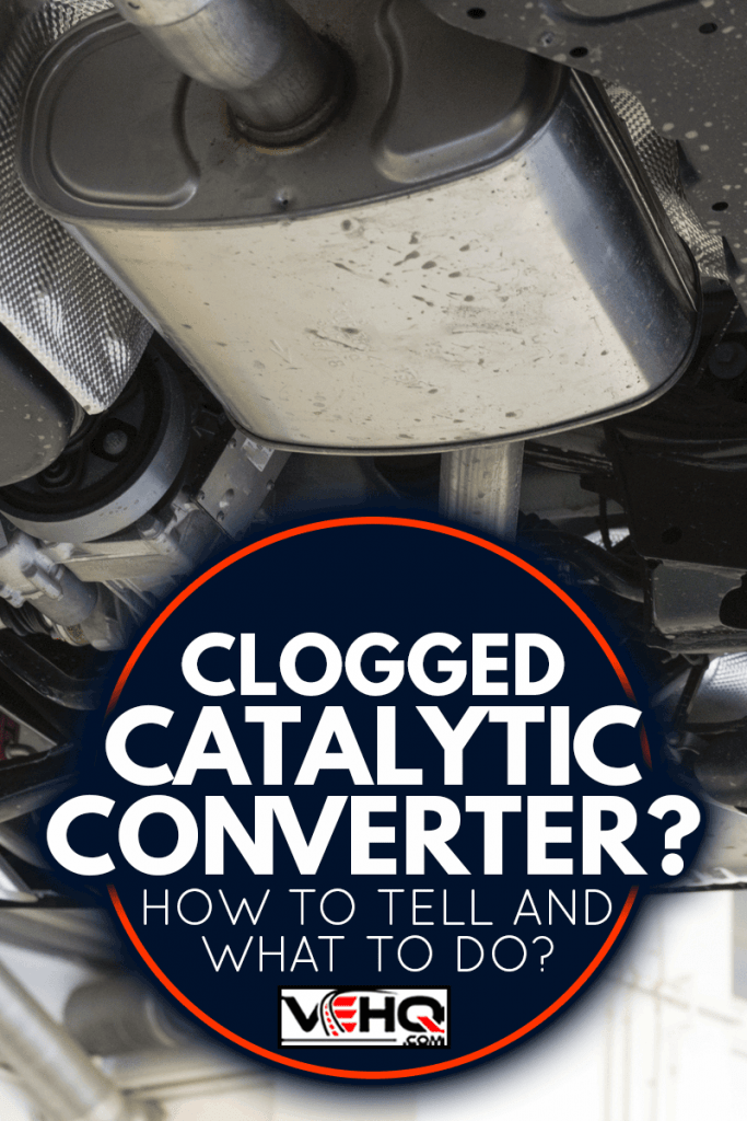 Catalytic converter. Car on a lift in a car service. View of the car from below, Clogged Catalytic Converter - How To Tell And What To Do?