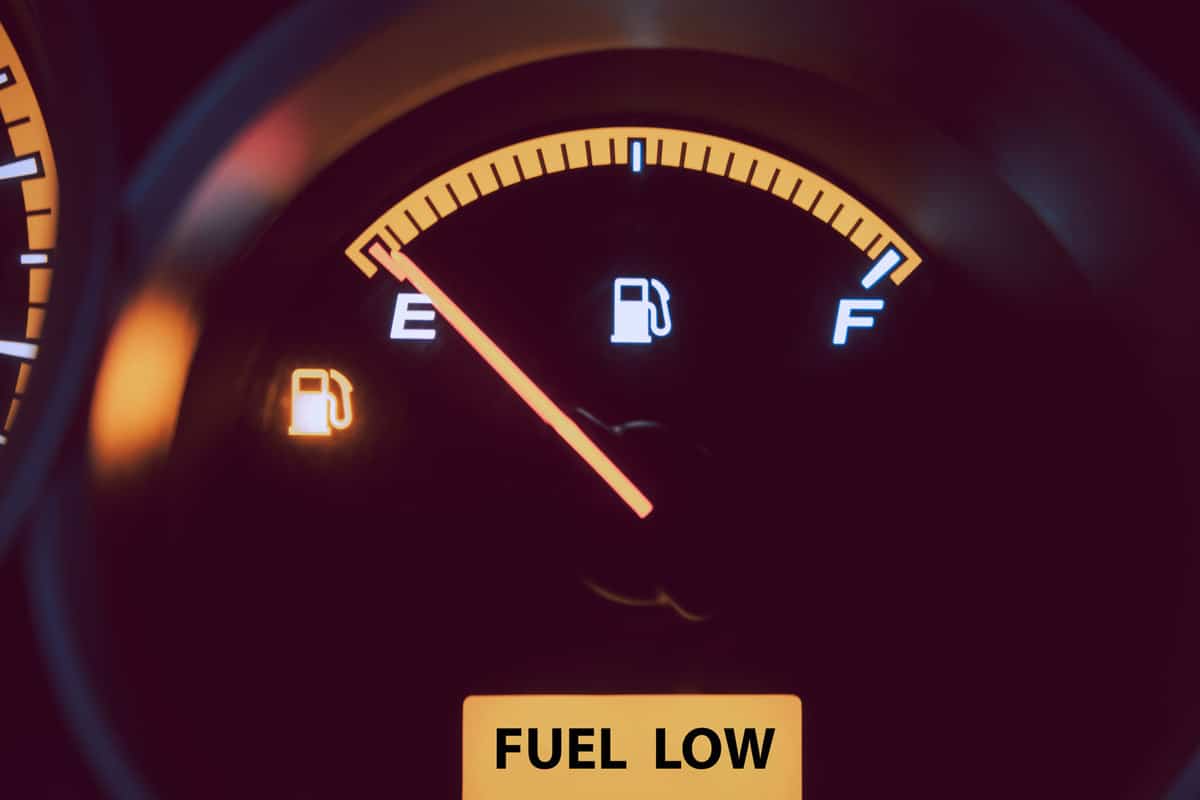 Close up low fuel guage shown in a car