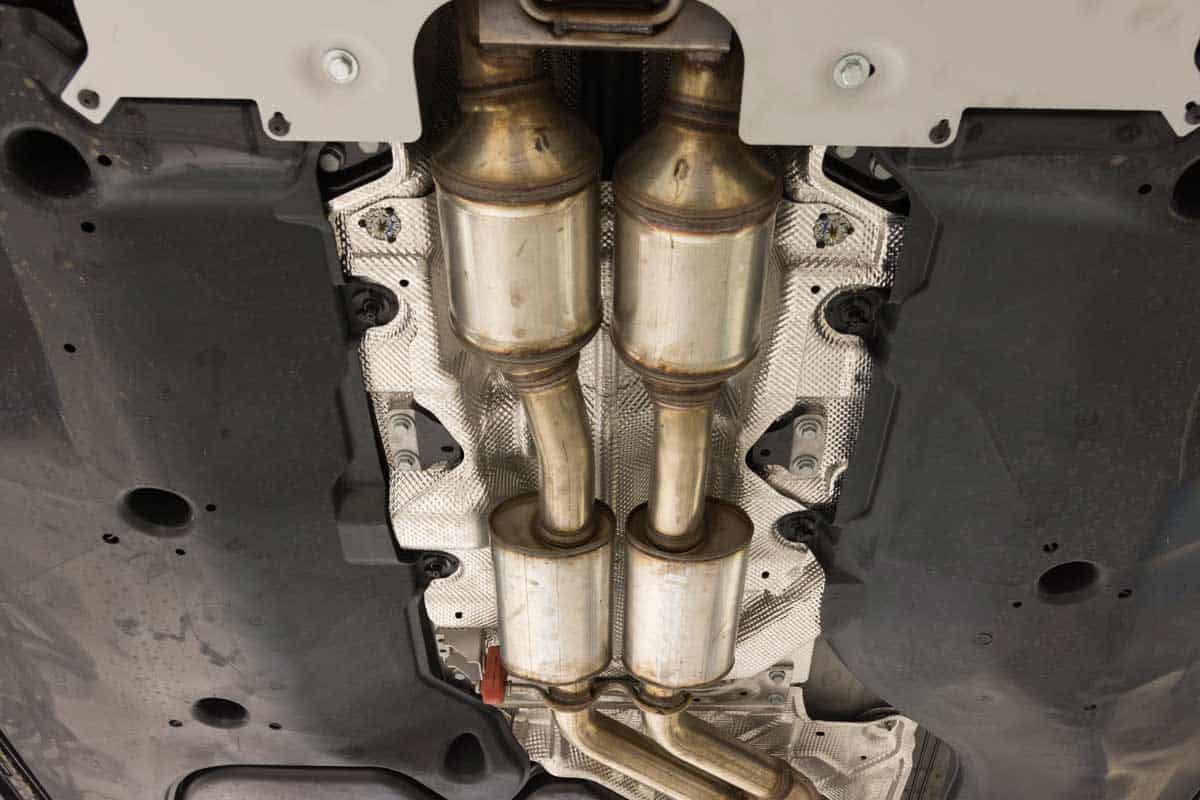 Exhaust system of a modern car bottom view with catalytic converter, Does A Catalytic Converter Reduce Power Or Affect Mileage?