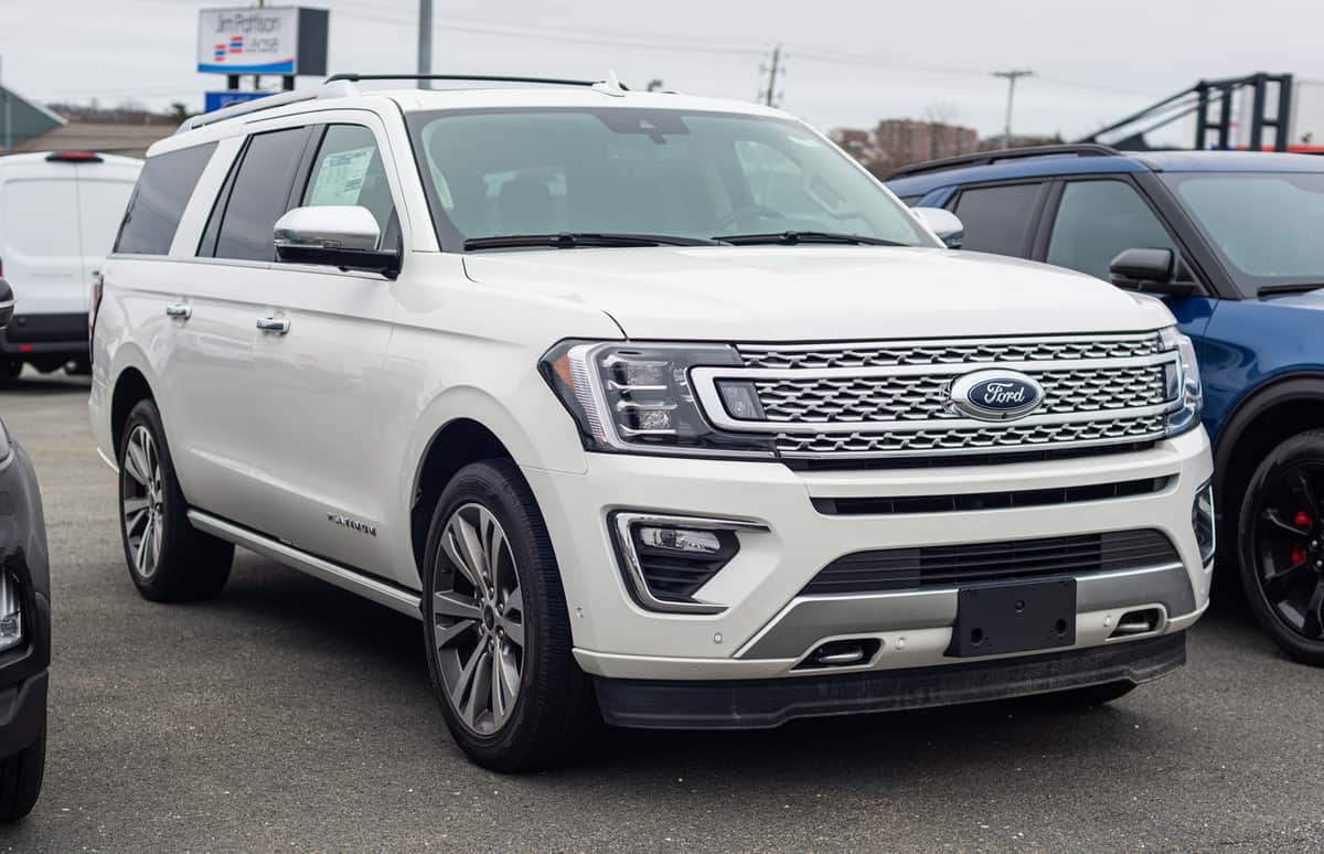 - New model Ford Expedition seven passenger suv at a dealership.