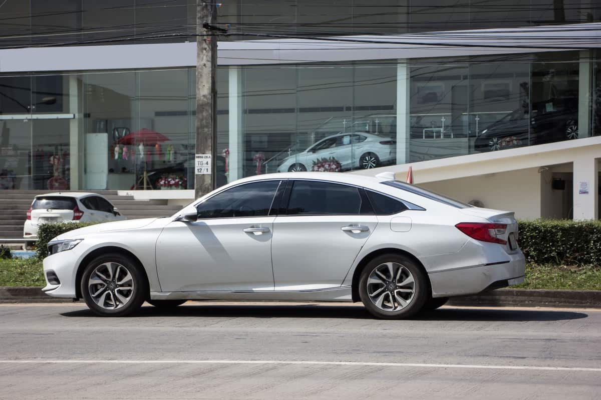 White colored Honda Accord parked outside a dealership, Is The Honda Accord AWD?