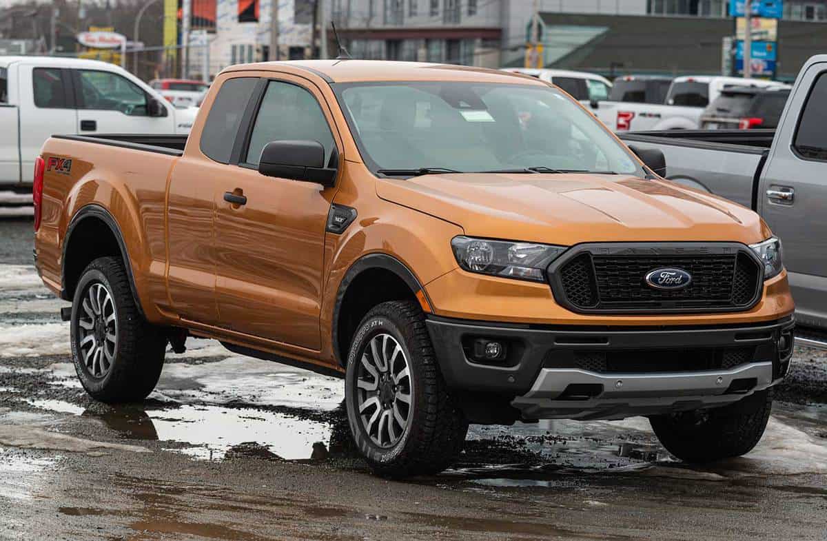 2020 Orange Ford Ranger pickup truck at a dealership
