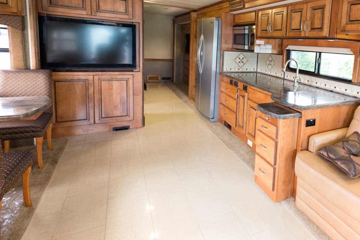 A view of the inside of a new RV mobile home, 9 Great RV Flooring Ideas To Consider