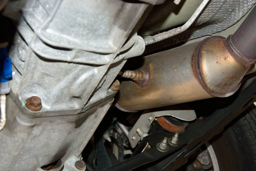 An up close photo of a cars catalytic converter