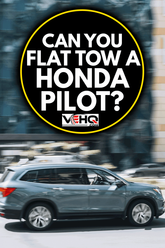 Gray Honda Pilot car moving on the street, Can You Flat Tow A Honda Pilot?