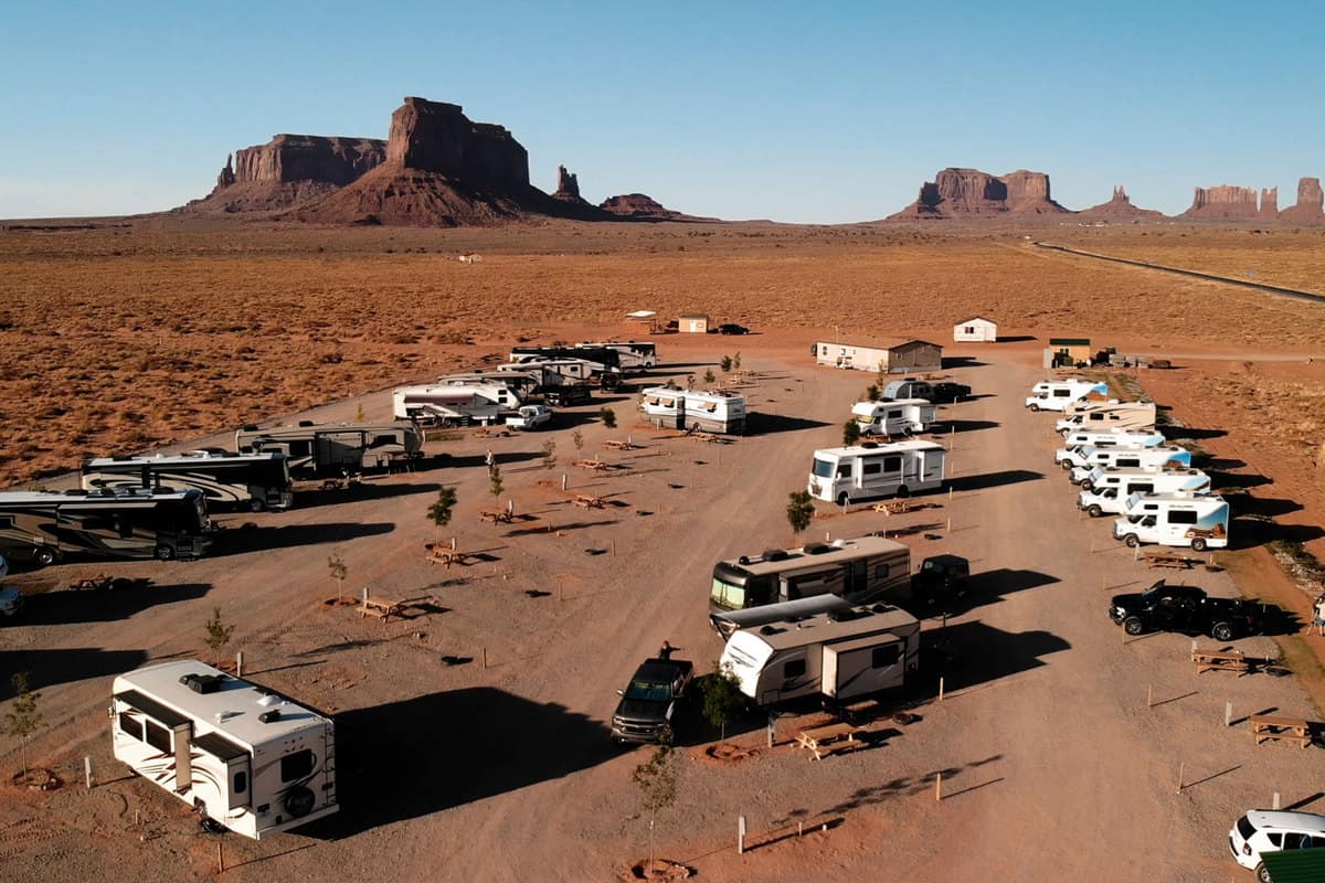 Dozens of RVs parked in the camping grounds of Arizona Monument park