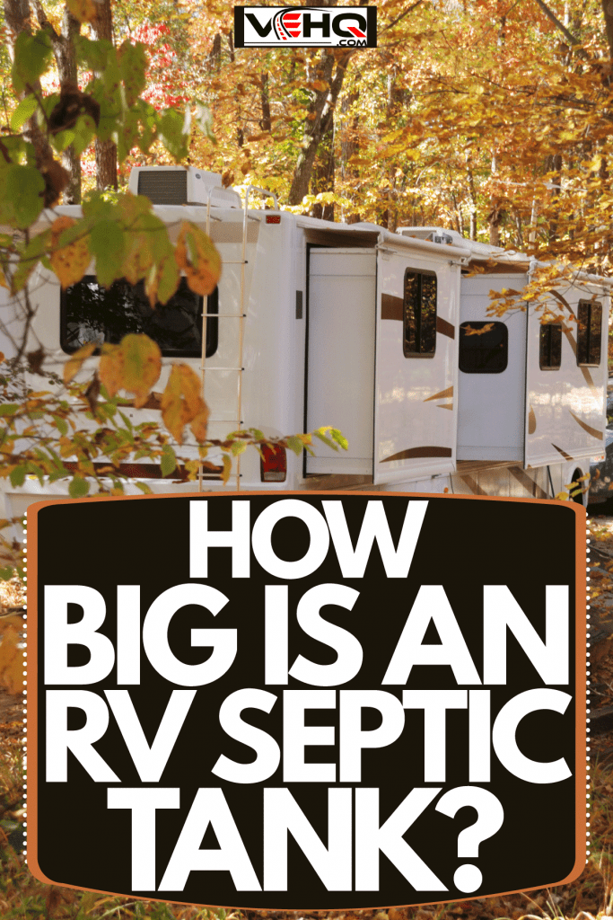 A camper van parked in a designated parking area for camping, How Big Is An RV Septic Tank?