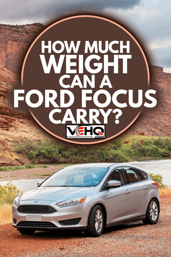 A Ford Focus is parked on the side of Utah state route 128 scenic byway aka The River Road near Moab, Utah, USA on an overcast day,How Much Weight Can A Ford Focus Carry?