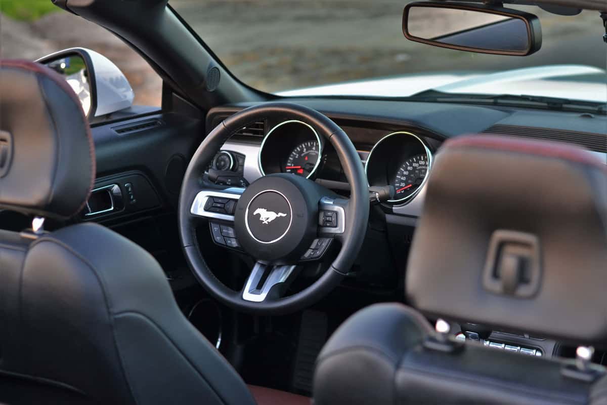 Interior in Ford Mustang Convertible. This elegant interior is made with high class materials, for example aluminium and cowhide