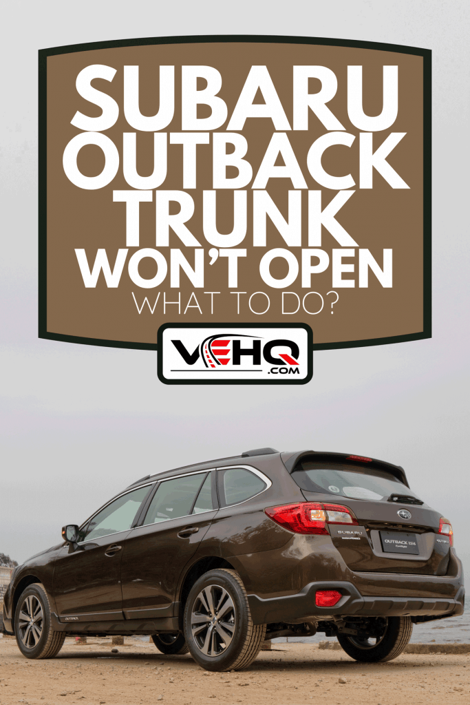 A Subaru Outback parked on the beach, Subaru Outback Trunk Won't Open - What To Do?