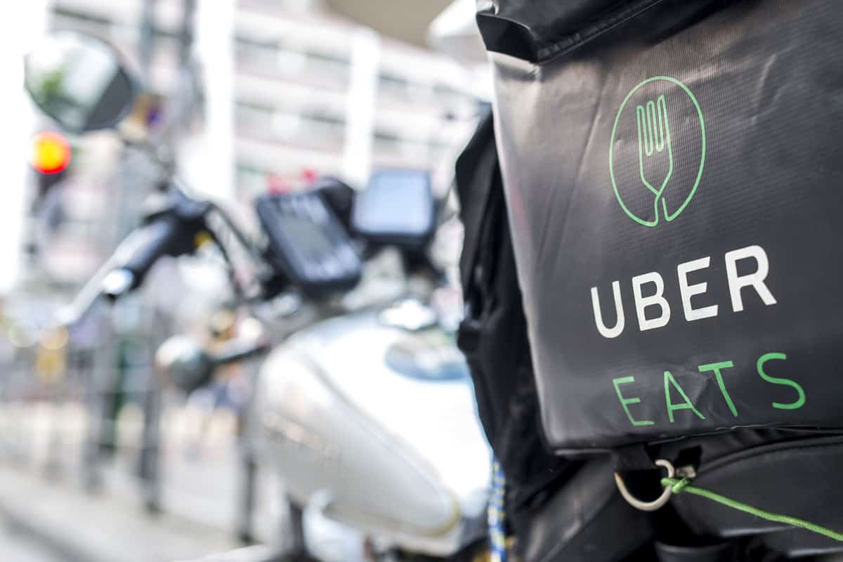 close up Uber Eats top box food carrier on motorcycle
